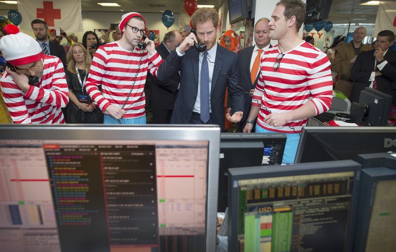 © Reuters. Britain's Prince Harry takes part in a charity trading day at ICAP in London