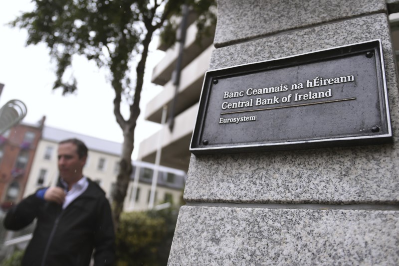 © Reuters. A man walks past the Central Bank of Ireland in Dublin