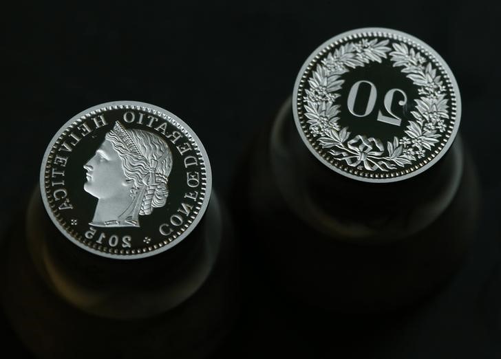 © Reuters. The original negative minting dies for a twenty cent Swiss Franc coin is seen at Swissmint in Bern