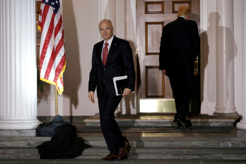 © Reuters. File picture of Andy Puzder, CEO of CKE Restaurants, departing after meeting with U.S. President-elect Donald Trump at the main clubhouse at Trump National Golf Club in Bedminster, New Jersey