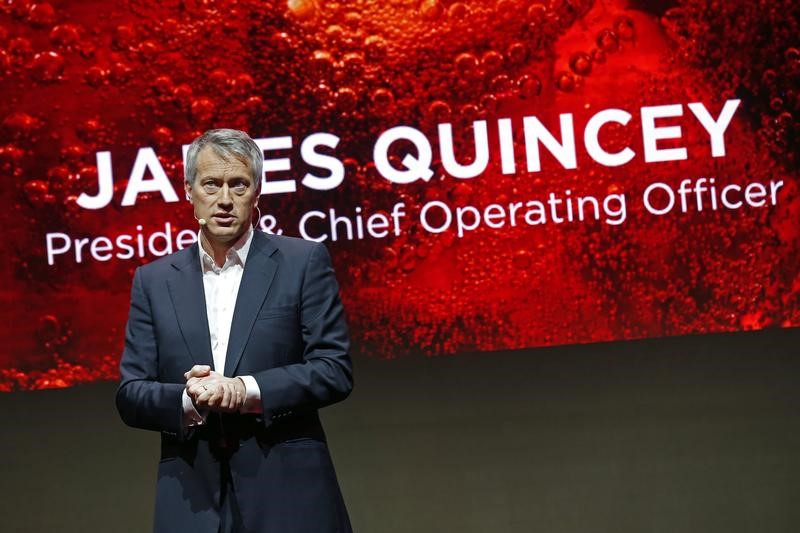 © Reuters. The Coca-Cola Company President and Chief Operating Officer James Quincey delivers a speech during a presentation in Paris