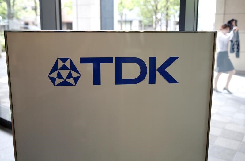 © Reuters. The logo of TDK Corp. is displayed at the entrance of the company headquarters building in Tokyo