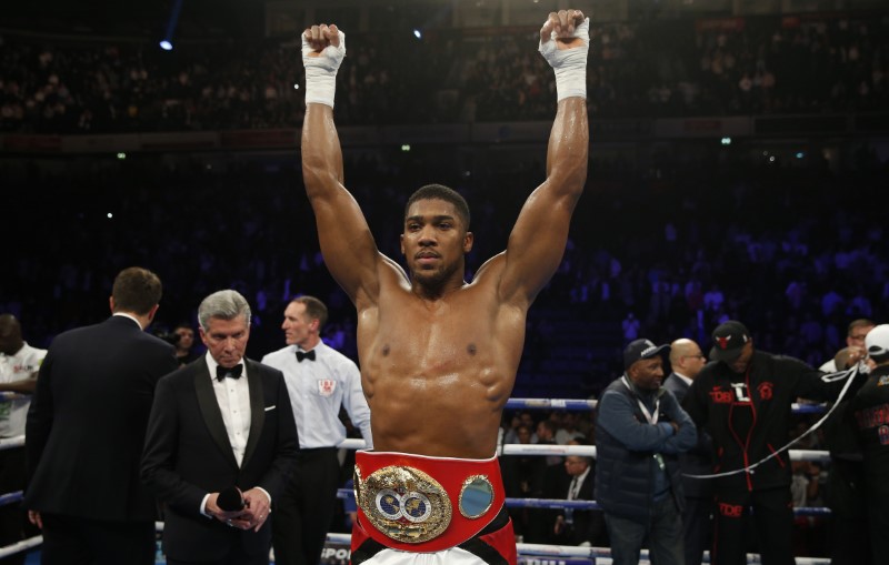 © Reuters. Anthony Joshua celebrates his win