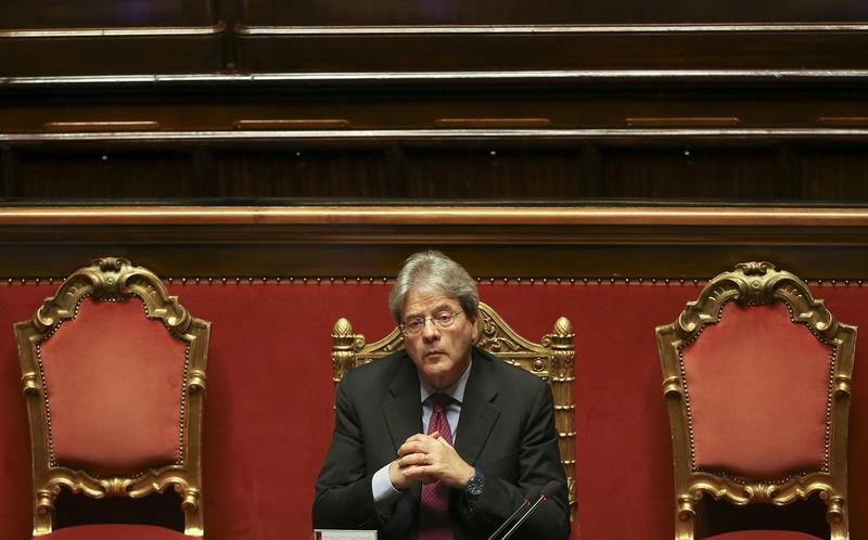 © Reuters. الرئيس الإيطالي يكلف وزير الخارجية بتشكيل حكومة جديدة