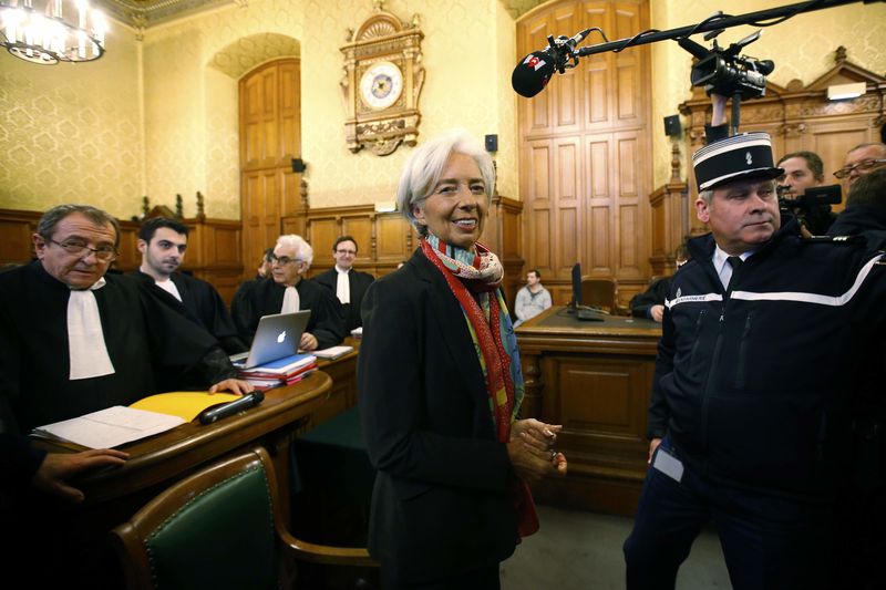 © Reuters. Managing Director of the International Monetary Fund Christine Lagarde is seen in the courtroom before the start of her trial about a state payout in 2008 to a French businessman, at the courts in Paris