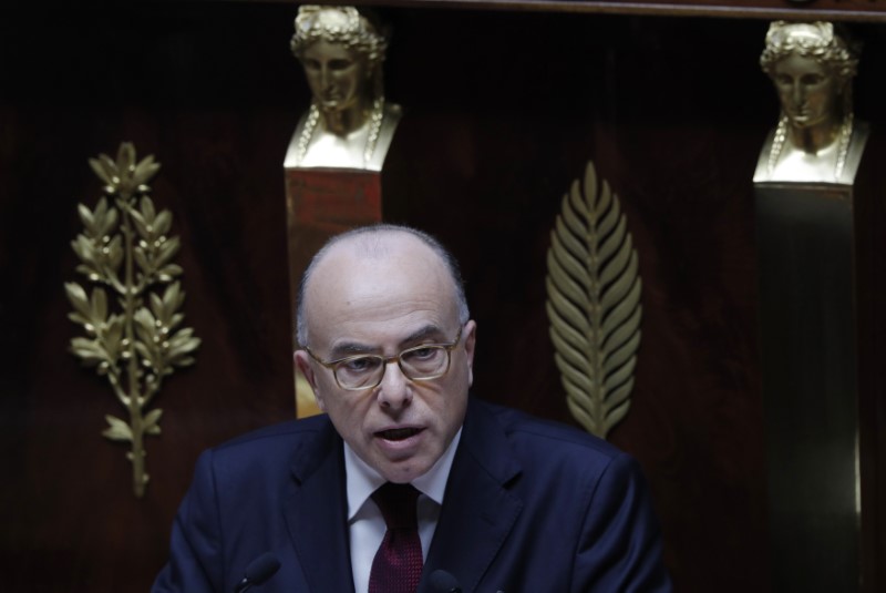 © Reuters. CAZENEUVE SE PRÉSENTE EN DÉFENSEUR DU MODÈLE SOCIAL FRANÇAIS