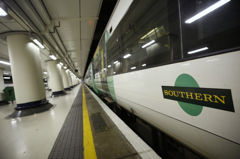 © Reuters. A Southern railway train stands at an empty platform at Victoria station in London