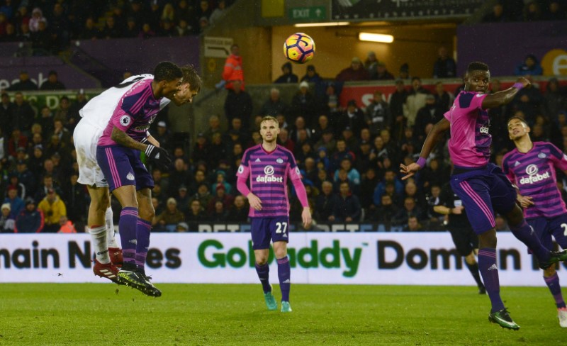 © Reuters. Swansea City's Fernando Llorente scores their third goal