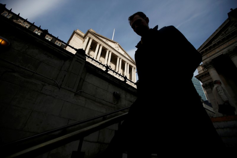 © Reuters. A man walks into Bank Underground station outside the Bank of England in the City of London