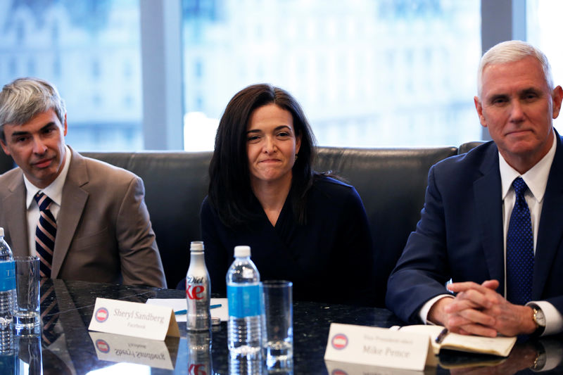 © Reuters. Larry Page, CEO and Co-founder of Alphabet, Sheryl Sandberg, Chief Operating Officer of Facebook, and Vice President-elect Mike Pence sit during a meeting with U.S. President-elect Donald Trump and technology leaders at Trump Tower in New York