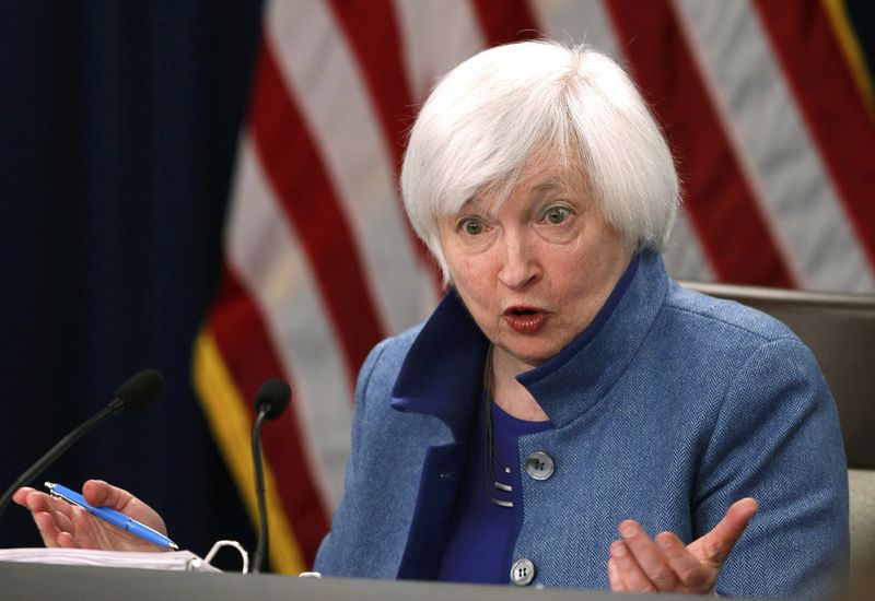 © Reuters. La Fed sube los tipos y prevé un ritmo más rápido de incrementos en 2017