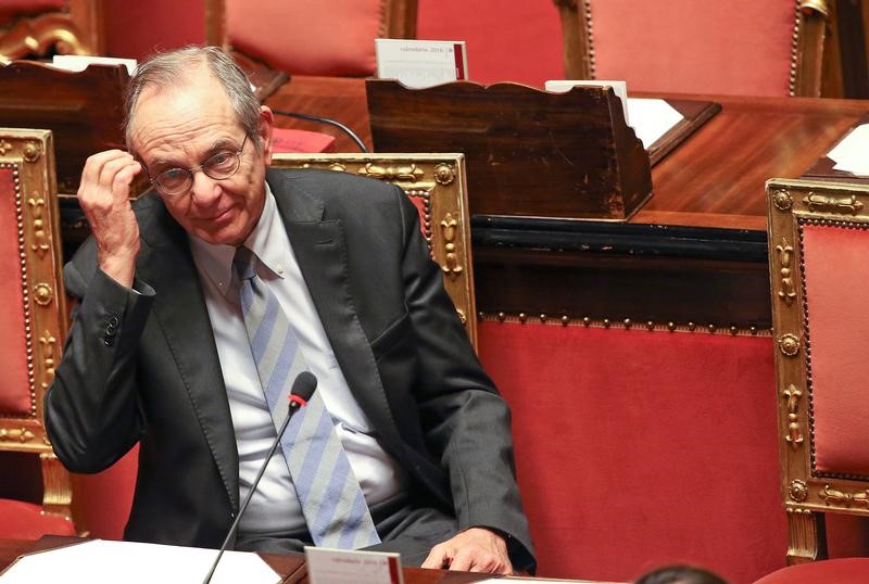 © Reuters. Italian Finance Minister Padoan looks on before a confidence vote at the Senate in Rome