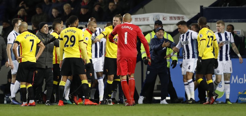 © Reuters. West Bromwich Albion and Watford players clash