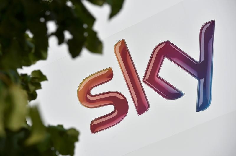 © Reuters. File photo of a Sky logo at the company's UK headquarters in west London