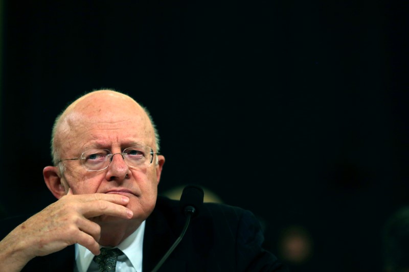 © Reuters. U.S. Director of National Intelligence James Clapper attends a hearing, where he announced his resignation, in Capitol Hill in Washington