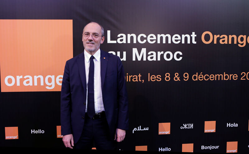 © Reuters. Chairman and CEO of French telecom operator Orange Stephane Richard poses for photographs after a press conference in Skhirat