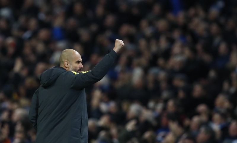 © Reuters. Manchester City manager Pep Guardiola celebrates after Pablo Zabaleta (not pictured) scores their first goal