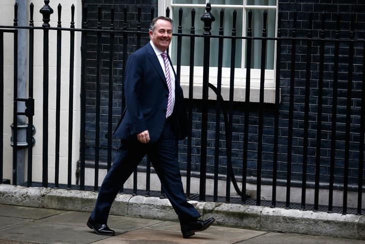 © Reuters. Britain's Secretary of State for International Trade Liam Fox arrives in Downing Street for a cabinet meeting, in London