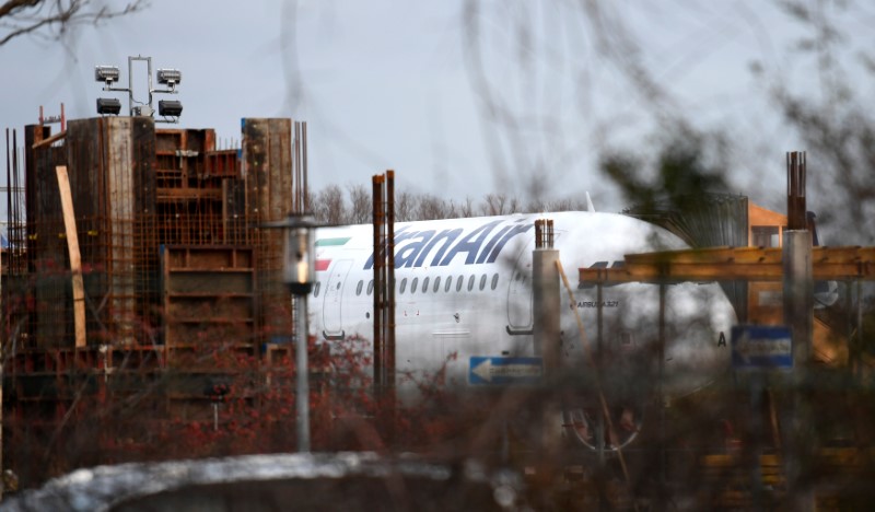 © Reuters. An Airbus A321 with the Iranian flag and description "The airline of the Islamic Republic of Iran" is parked at the Airbus facility in Hamburg