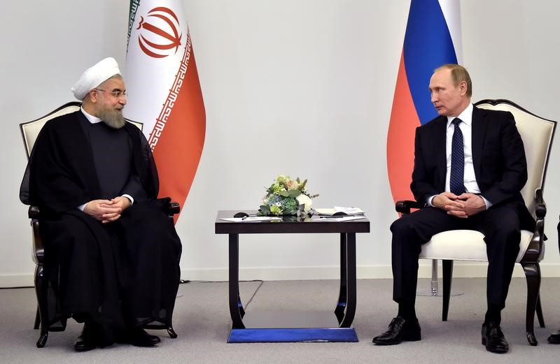 © Reuters. الكرملين: بوتين يبلغ روحاني برغبته في حل الصراع السوري سريعا