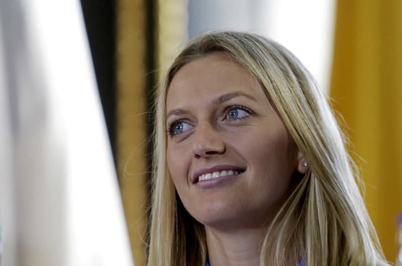 © Reuters. FILE PHOTO: Czech Republic's Petra Kvitova smiles during the draw for the Fed Cup final in Prague