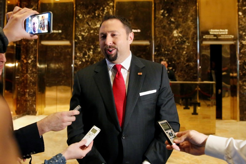 © Reuters. Communications adviser Jason Miller speaks to the media in the lobby of Republican president-elect Donald Trump at Trump Tower in New York