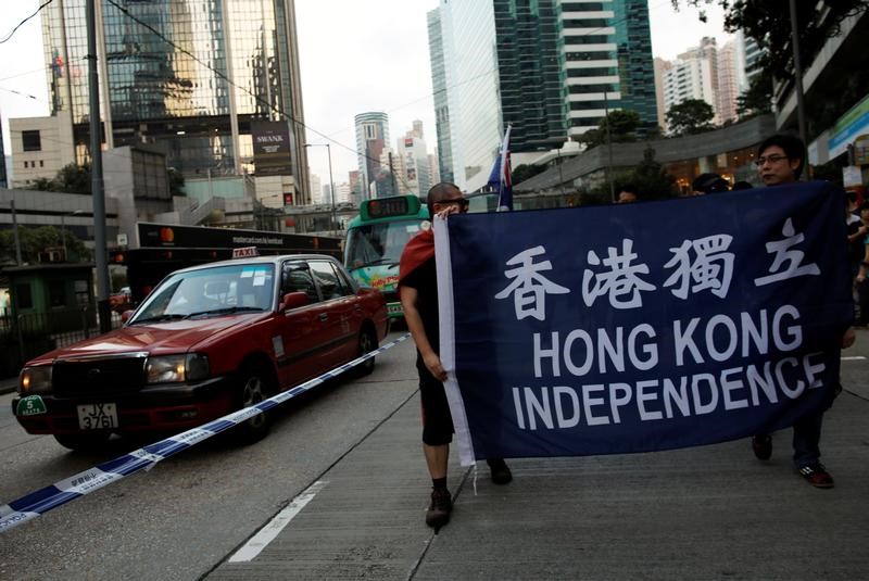 © Reuters. Demonstrators protest in Hong Kong