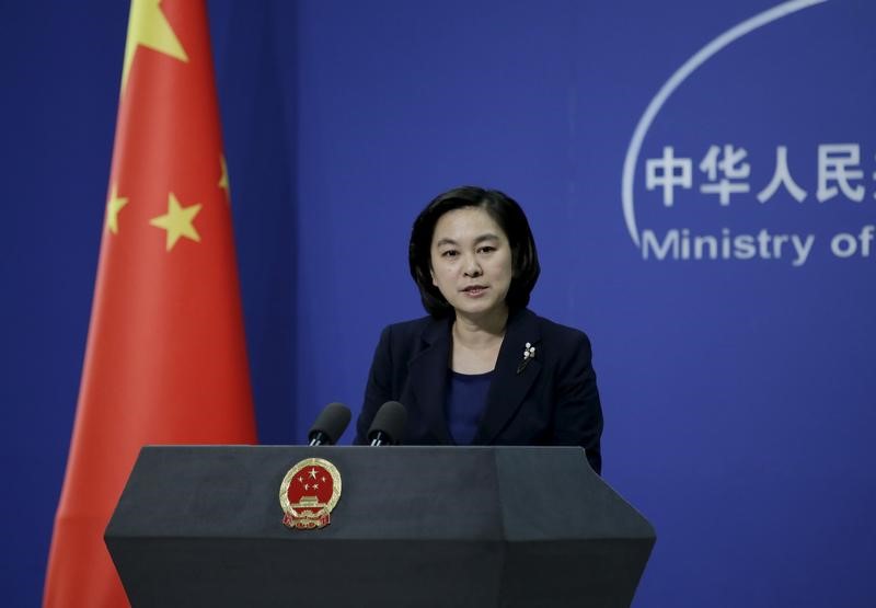© Reuters. Hua Chunying, spokeswoman of China's Foreign Ministry, speaks at a regular news conference in Beijing
