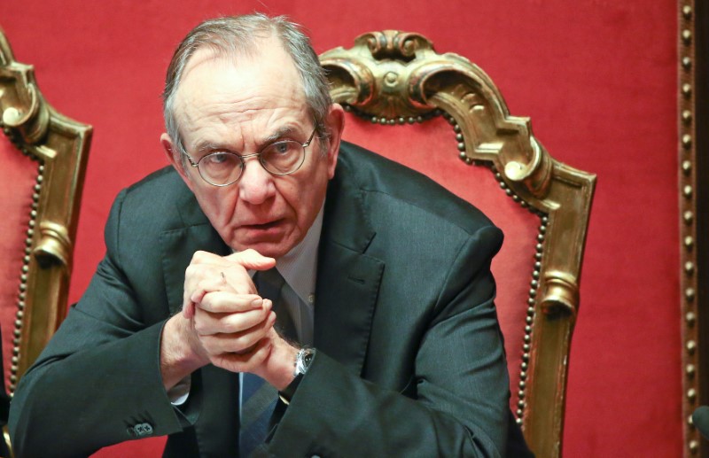 © Reuters. Italian Finance Minister Padoan looks on before a confidence vote at the Senate in Rome