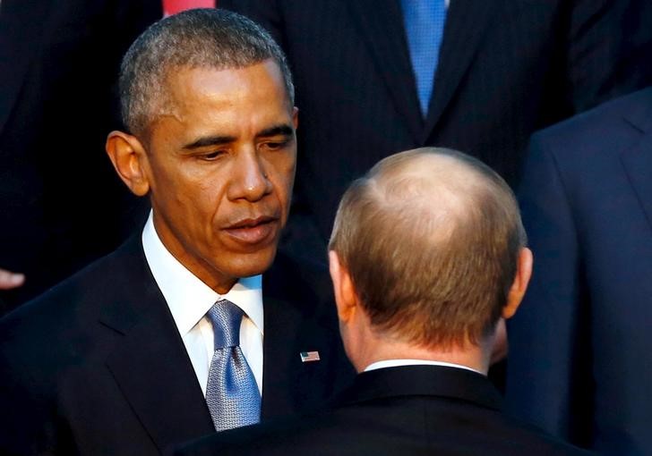 © Reuters. Президент США Барак Обама и президент РФ Владимир Путин перед началом саммита G20 в Анталье