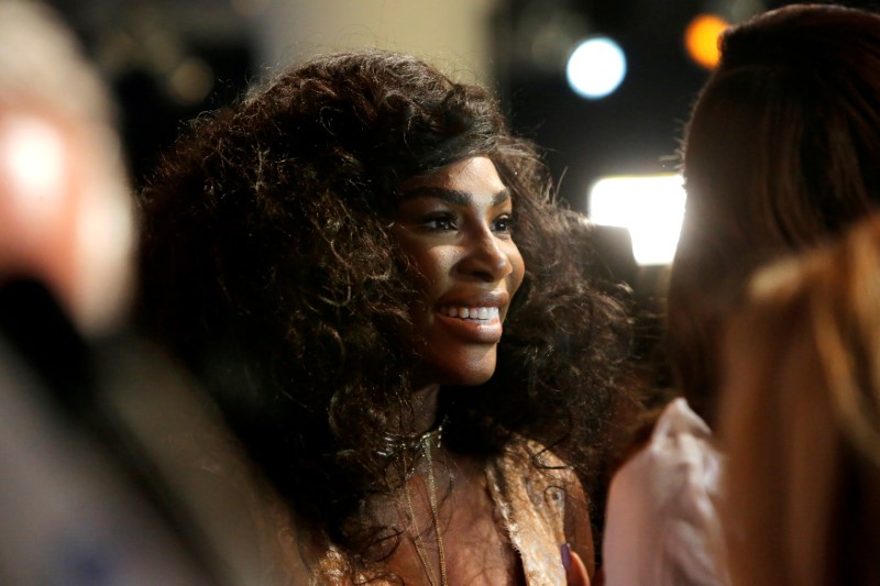 © Reuters. File Photo : Tennis player Serena Williams speaks to the media as she arrives to present the Serena Williams Signature Statement Fall Collection at New York Fashion Week in Manhattan, New York, U.S.