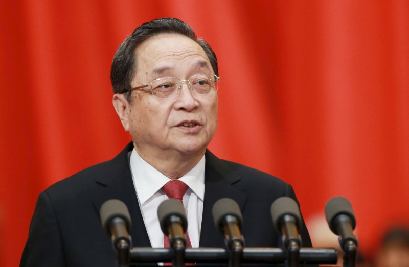 © Reuters. Yu Zhengsheng, chairman of the CPPCC gives a speech during the opening session of the Chinese People's Political Consultative Conference at the Great Hall of the People in Beijing