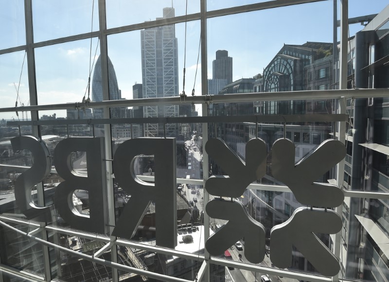 © Reuters. The City of London business district is seen through windows of the Royal Bank of Scotland headquarters in London