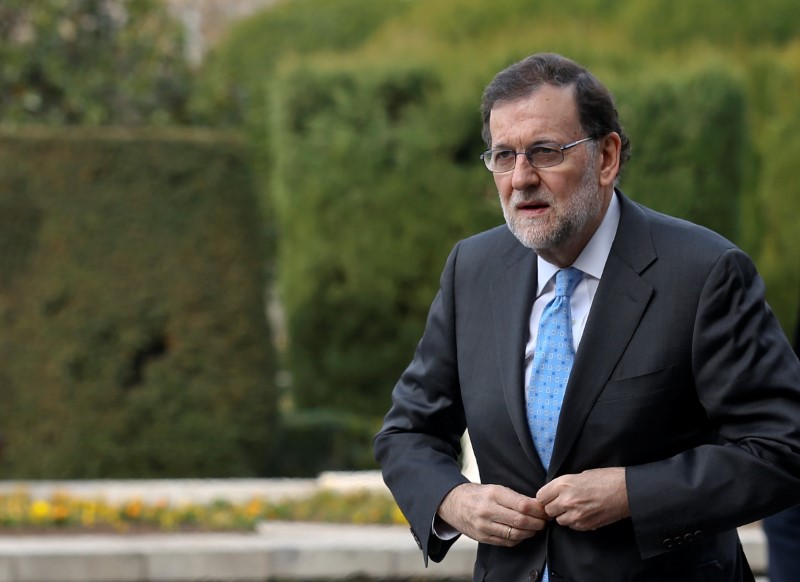 © Reuters. Spanish Prime Minister Mariano Rajoy arrives for an event in Madrid
