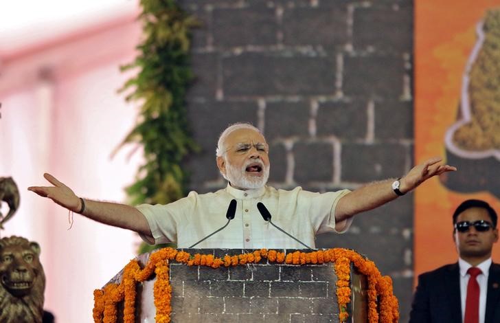 © Reuters. India's PM Modi speaks after laying the foundation for the memorial of Chhatrapati Shivaji Maharaj, in Mumbai