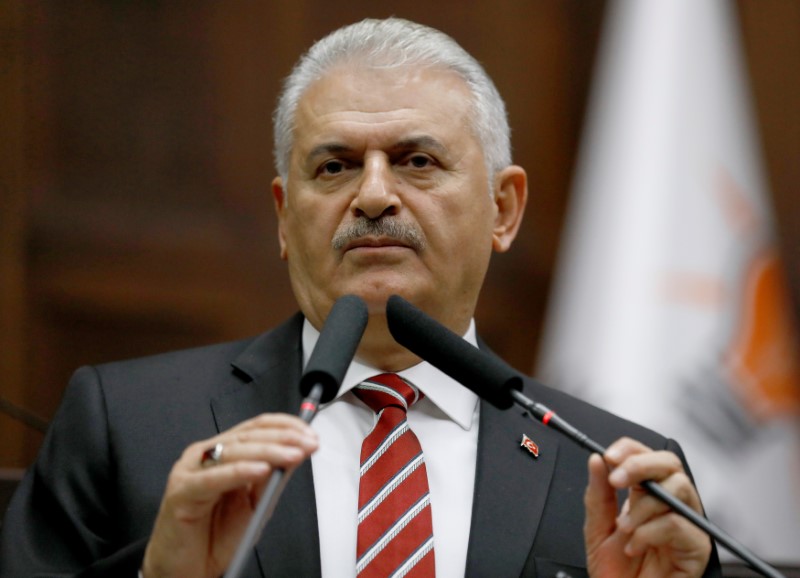 © Reuters. Turkey's Prime Minister Binali Yildirim addresses members of parliament from his ruling AK Party during a meeting at the Turkish parliament in Ankara