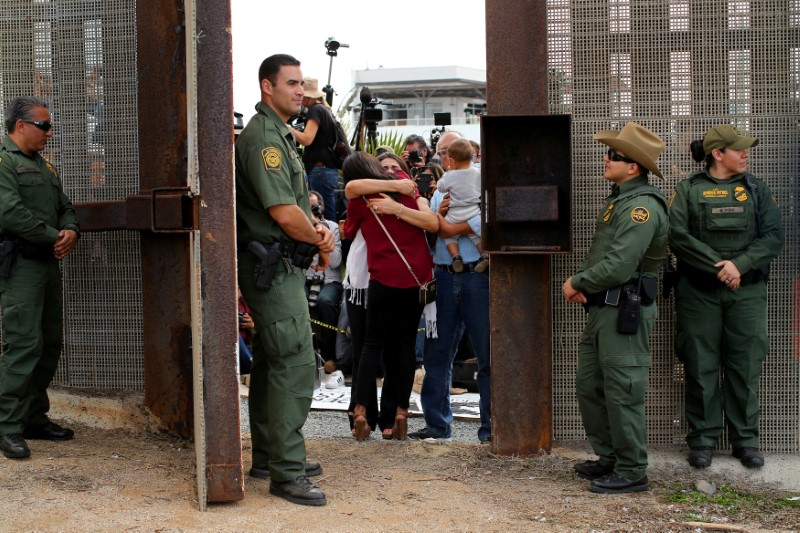 © Reuters. File photo of the border fence gate between U.S. and Mexico opened for a few hours to allow separated families to embrace as part of Universal Children's Day