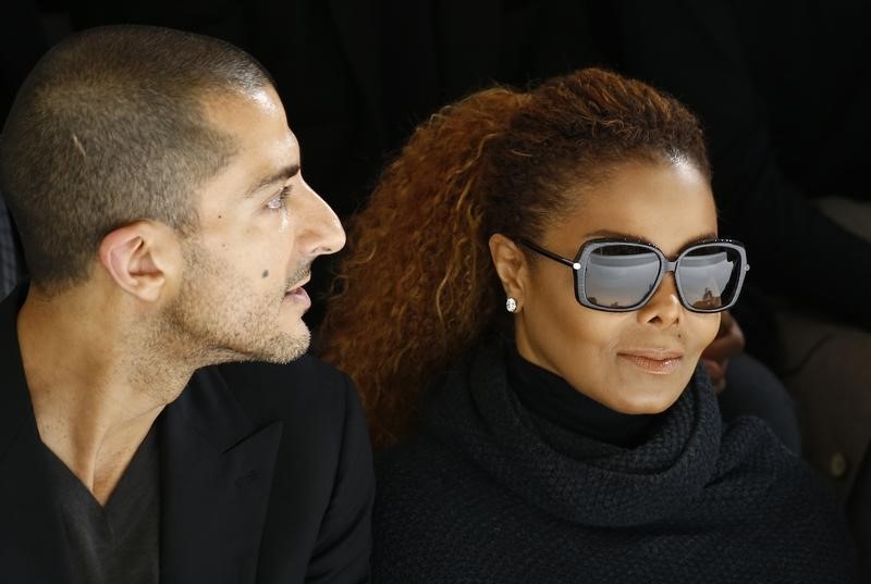 © Reuters. Janet Jackson e o marido Wissam Al Mana durante evento em Paris