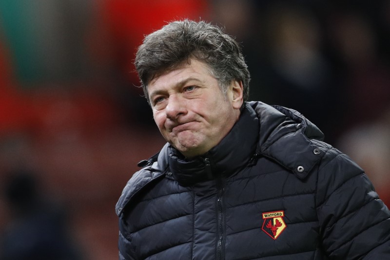 © Reuters. Watford manager Walter Mazzarri looks dejected after the game