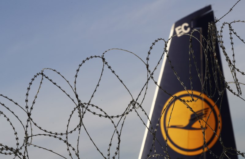 © Reuters. The tail of a parked plane is pictured during a pilots strike of German airline Lufthansa at Frankfurt airport