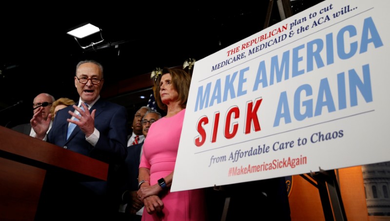 © Reuters. Pelosi and Schumer talk about the Affordable Care Act in Washington