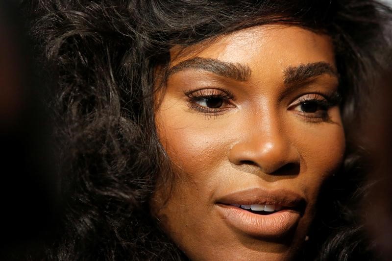 © Reuters. Tennis player Serena Williams speaks to the media as she arrives to present the Serena Williams Signature Statement Fall Collection at New York Fashion Week in Manhattan, New York, U.S.