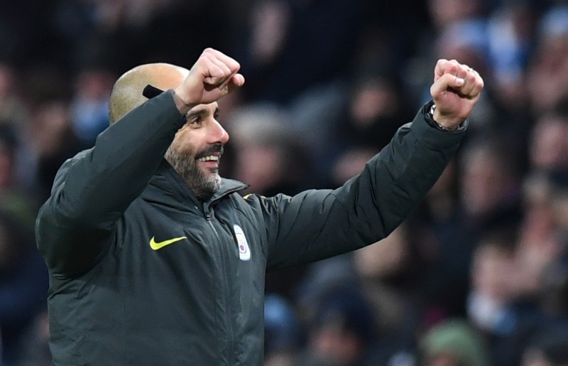 © Reuters. Manchester City manager Pep Guardiola celebrates after the game