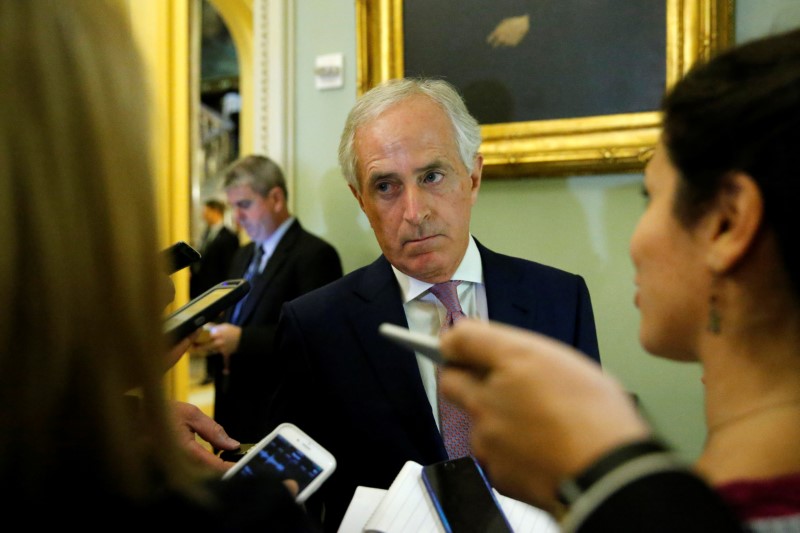 © Reuters. Corker talks with reporters before the weekly Republican caucus policy luncheon at the U.S. Capitol in Washington