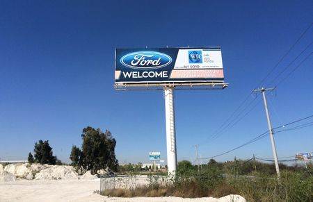 © Reuters. Billboard welcoming Ford Motor Co is seen at an industrial park in San Luis Potosi