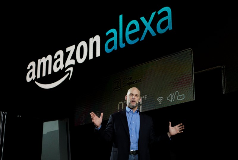 © Reuters. Mike George, VP Alexa, Echo and Appstore for Amazon, speaks during the LG press conference at CES in Las Vegas