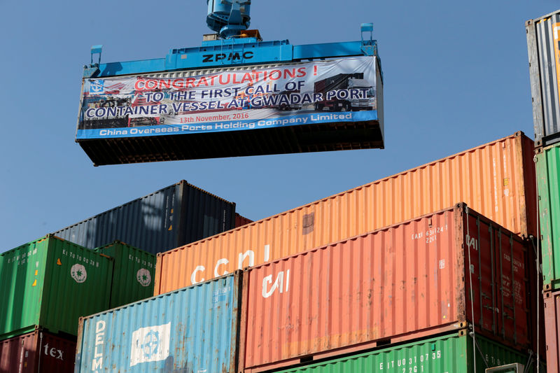 © Reuters. FILE PHOTO: A container is loaded on to the first Chinese container ship to depart after the inauguration of the China Pakistan Economic Corridor port in Gwadar