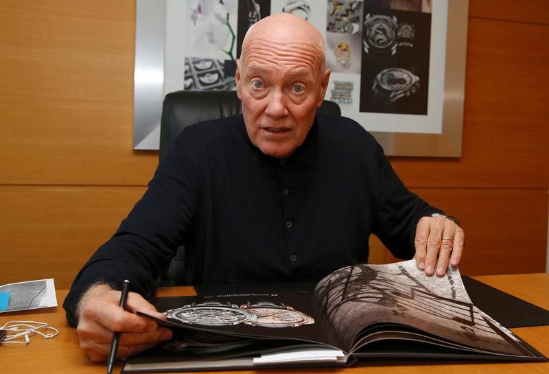 © Reuters. Jean-Claude Biver, CEO of Tag Heuer and LVMH's head of watches, poses at his office in Paris