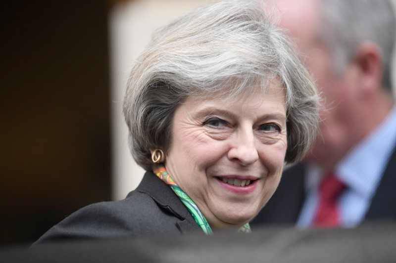 © Reuters. Britain's Prime Minister Theresa May leaves after giving a speech on mental health, in central London