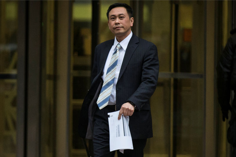 © Reuters. FILE PHOTO - Defendant Wing Chau exits the Jacob Javits Federal building in New York